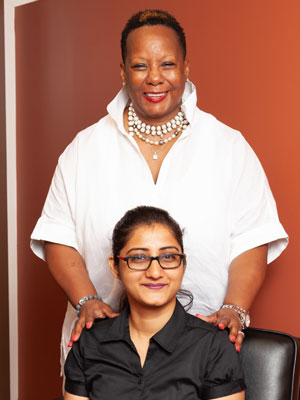 Marjorie A. Perry ’05 (standing) with her mentee and NJIT alumna, Rashmi Kamkeri ’18