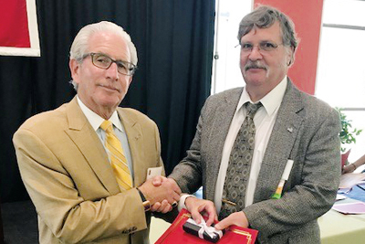 Photo of NJIT President Joel S. Bloom congratulating Martin J. Szewczyk ’76 at the annual Cornerstone Brunch.